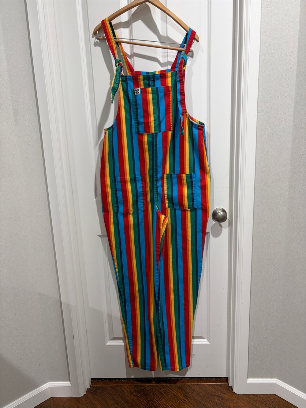 Lucy & Yak Rainbow Stripe Cotton Jumpsuit in Red, Orange, Yellow, Green, Blue